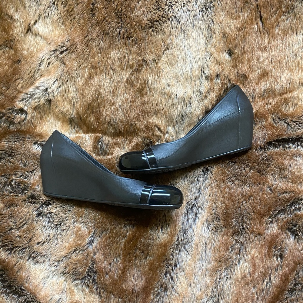 Black cap toe crocs wedges